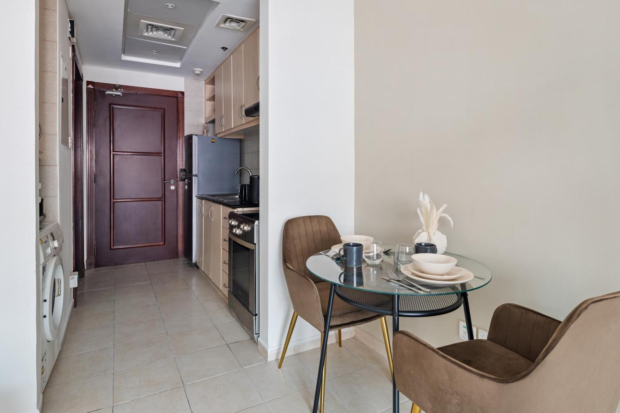 Charming Dubai Studio - Elegant Apartment Bagian luar foto